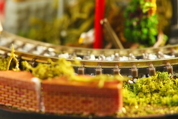 The miniature plactic model train layout represent the japanese culture and public transportation concept related idea.