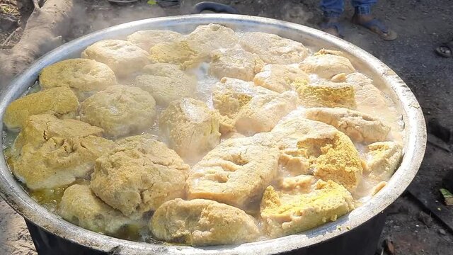 Rajasthani Traditional Cuisine Dal Baati Also Know as Dal Bati or Daal Baati Churma pot, is popular in Rajasthan, Uttar Pradesh, and Madhya Pradesh, great Indian food.