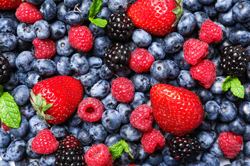 Different fresh berries as background