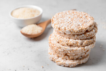 Stack of rice crackers on light background