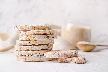 Stack of rice crackers on light background