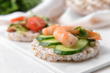 Tray with rice cracker on light background
