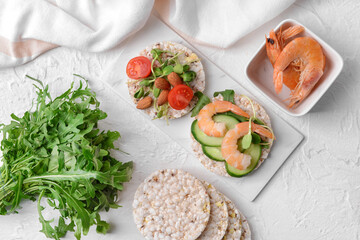 Composition with rice crackers on light background