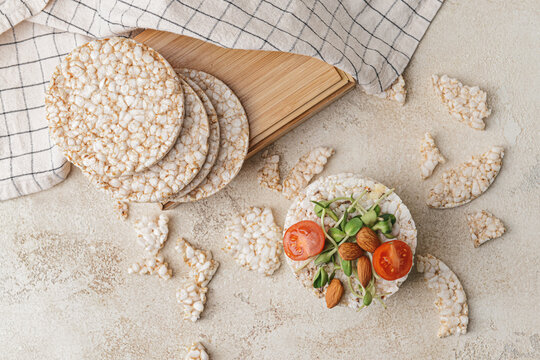 Composition with rice crackers on grunge background