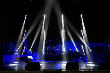 scene, stage light with colored spotlights and smoke
