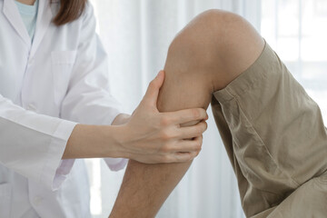 Male patients consulted physiotherapists with knee pain problems for examination and treatment in rehabilitation centers. Rehabilitation physiotherapy concept