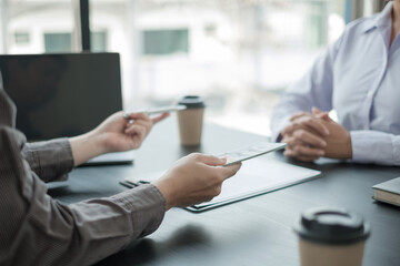 Corruption. Businessmen make an agreement with the money proposed his partner to bribe in the...