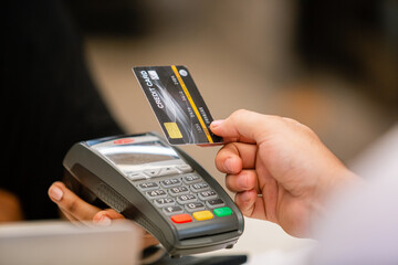 Credit card payment with POS terminal, Money payment shopping online in store. Transaction wallet banking. Spending instead of cash.
