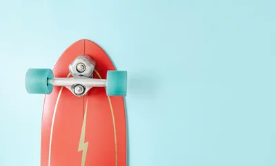 Zelfklevend Fotobehang Minimal red surf skate or skateboard on blue color background. Sport activity lifestyle concept, Copy space. © oatawa