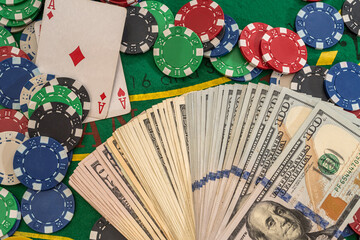 Poker combination with chips playing cards and win dollars in casino table