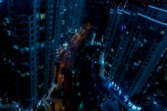 High buildings and night city lights.  View from above.