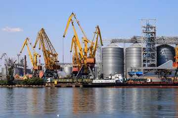 Obraz premium Odessa, Ukraine Marine Industrial Commercial Port. Industrial zone of Odessa sea port. Container cranes. Cargo container terminal of sea port.