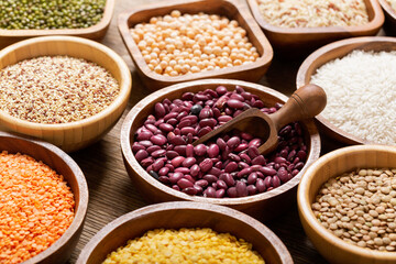 bowls of legumes, lentils, chickpeas, beans, rice and cereals
