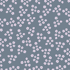 Seamless pattern with small round flowers. Endless background.. Texture with densely arranged small flowers. Abstract pattern in gray colors.