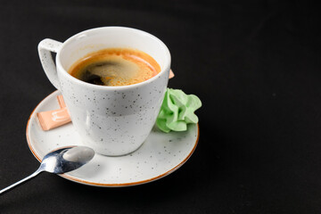 Coffee espresso over black background. Coffeee time, isolated on black.