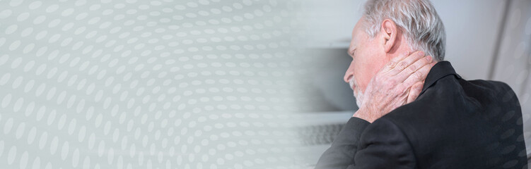Senior man suffering from neck pain; panoramic banner