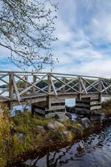 Fototapeta premium View of the wooden bridge, Liesjarvi National Park, Tammela, Finland