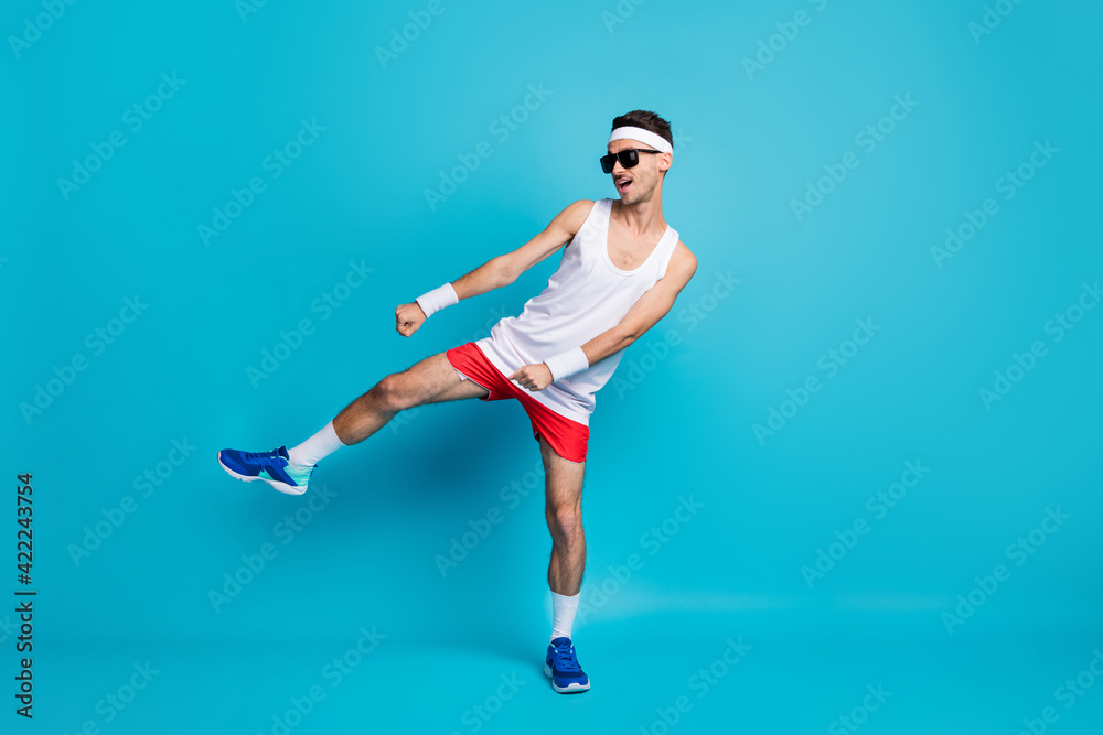 Canvas Prints Full size photo of handsome sporty man dance funky wear sunglass sportswear isolated on blue color background