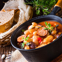 Delicious bean stew with sausage and potato