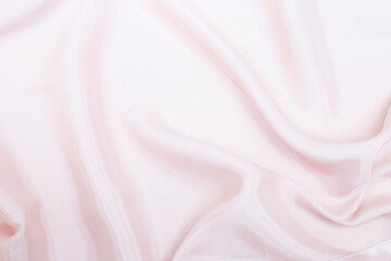 Abstract soft pink fabric texture background, silky pink fabric background