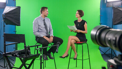 Recording interview with politician using professional tv green screen studio - Powered by Adobe