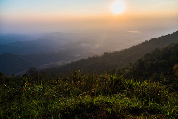The natural mountain view with fog in the morning,sunrise view