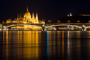 Margaret bridge and Parliament building in Budapest at night