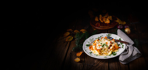 Tagliatelle with fresh chanterelles in a mushroom sauce