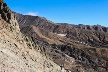 Fototapeta na wymiar Trekking around volcanoes of Kamchatka in fall season 