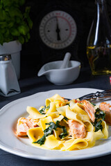 Tagliatelle with salmon and spinach in a cream sauce
