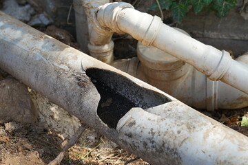Repair and replacement of broken waste water pvc plastic sewer pipe, drainage of waste water from...