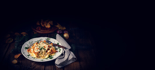 Tagliatelle with fresh chanterelles in a mushroom sauce