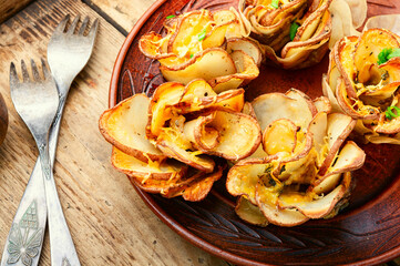 Baked potatoes in bacon