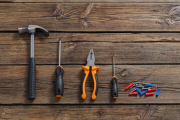 building tools on dark wooden background