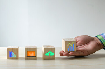 Hand holding cubes business graph  icons.Business concept