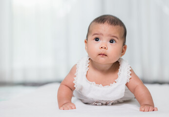 Fototapeta premium Asian baby cute in the living room at home with family.