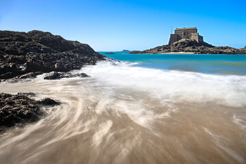 the tide recedes at Grand Bé island in St Malo