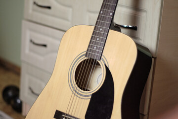 Guitar On Stand In Room