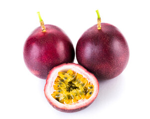 Close-up of half-cut passion fruit with bright yellow pulp