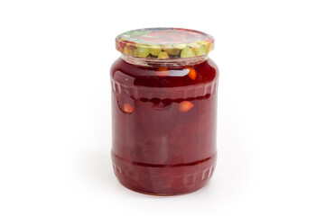 Apricot jam with apricot kernels addition in glass jar