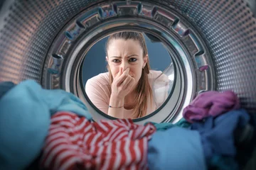 Foto op Canvas Smelly washing machine and laundry © StockPhotoPro