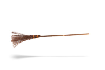 Witches broomstick flying on a isolated white background