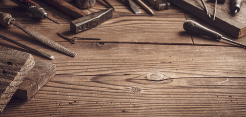 Professional vintage carpentry tools on a wooden table - obrazy, fototapety, plakaty