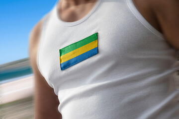 The national flag of Gabon on the athlete's chest