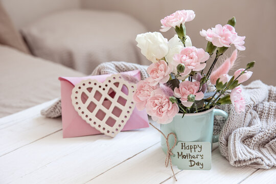 Cozy still life for Mother's Day with fresh flowers and decor details.
