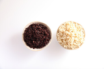 Organic boiled brown rice on bowl isolated in white background