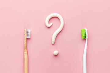 Bamboo toothbrush with toothpaste, overhead view.Dental hygiene concept