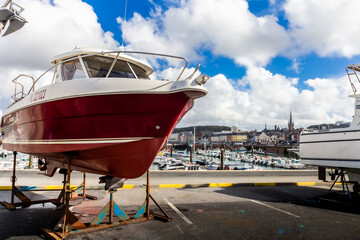 Fecamp, Normandy, France - August 28, 2020. Beautiful panoramic view on main harbor with yachts, fish sailing boats. Albaster coast.