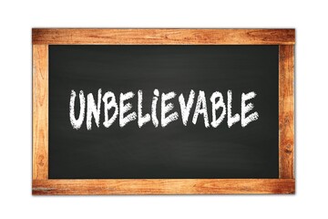 UNBELIEVABLE text written on wooden frame school blackboard.