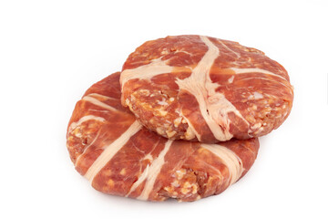 Fresh raw burger patty isolated on white background